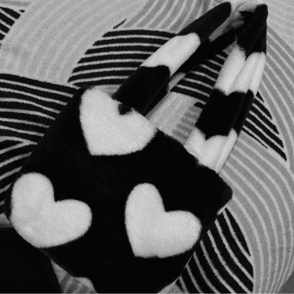 fluffy black and white purse